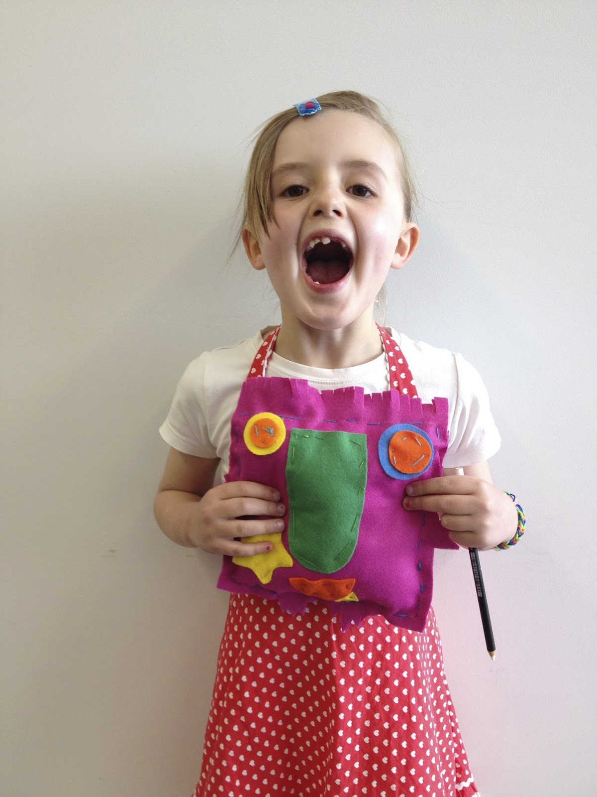teaching a child to sew